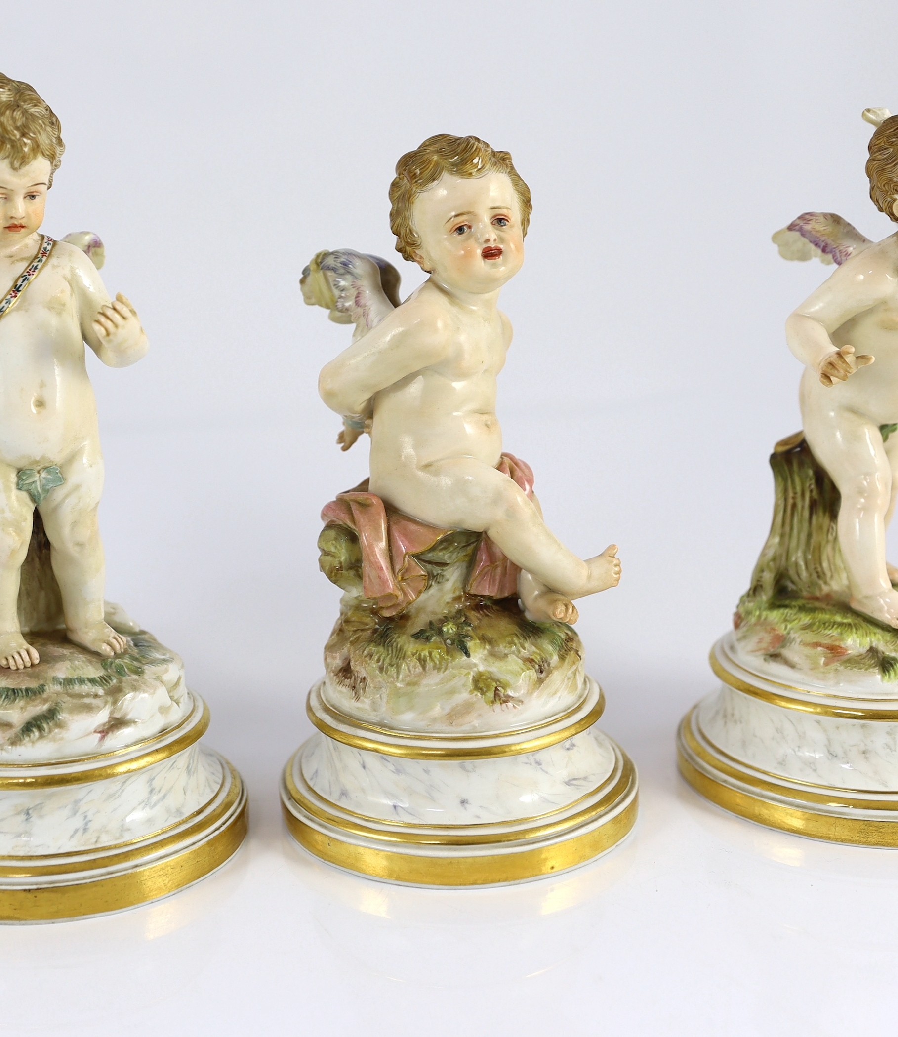 A series of five Meissen porcelain figures of Cupid, late 19th century, modelled by Heinrich Schwabe, 15.5cm - 20cm high, perplexed Cupid restored, Provenance - purchased from Winifred Williams, Eastbourne/London before